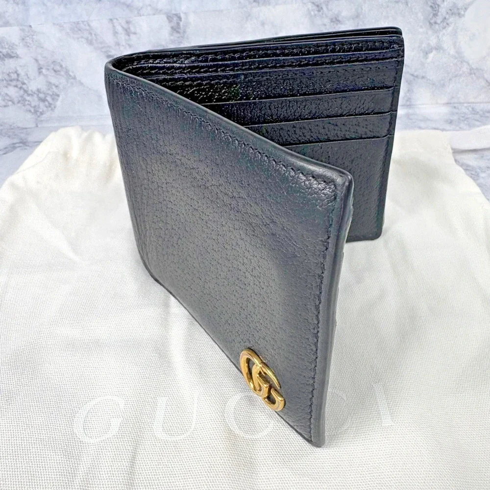 Gucci Men Black Leather Bifold Wallet W/ Gold GG Logo Authentic Unique Pocket